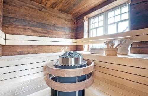 Lobbe Villa | Strandhaus "Oie" in Lobbe mit Meerblick, Kamin, Sauna