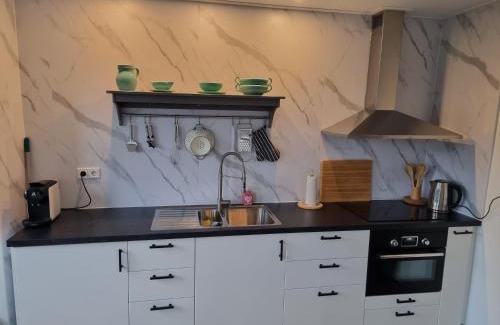 Julianadorp aan zee Apartamento | Strandhuisje achter de duinen.