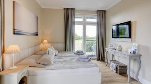 Fehmarnsund Apartamento | Strandresidenz Vogelflug Meerblick Porschen