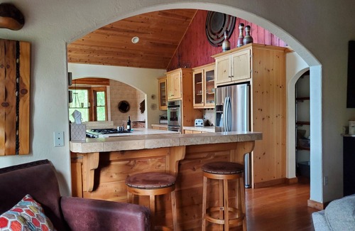 Comeback Bay Casa | Striking LAKEFRONT home w/ hot tub, dock, highspeed WIFI & week/month discounts