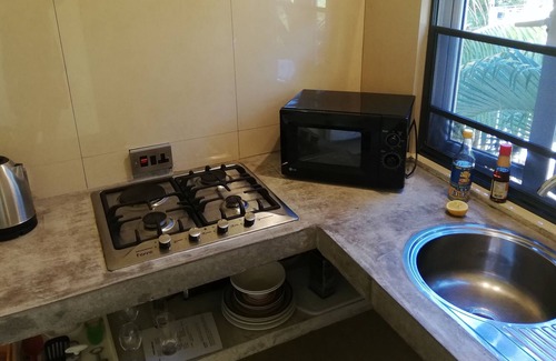 La Gaulette Apartamento | Studio 3 Exuberantes vistas a las montañas volcánicas enclavadas en árboles frutales tropicales