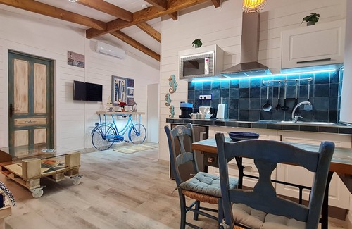 Hoya de los Patos Apartamento | Apartamento estudio 'Tabarca' con piscina compartida, Wi-Fi y aire acondicionado.