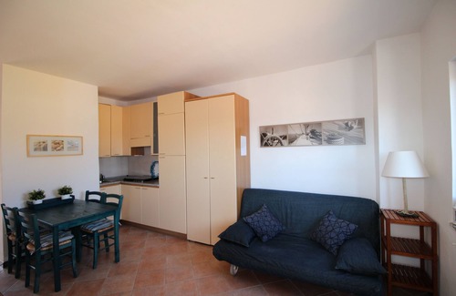 Porto Pollo Apartamento | Studio apartment with sea view terrace and garden with barbecue