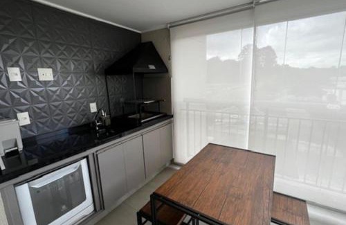 Picanco Apartamento | Studio Cidade Maia equipado 13