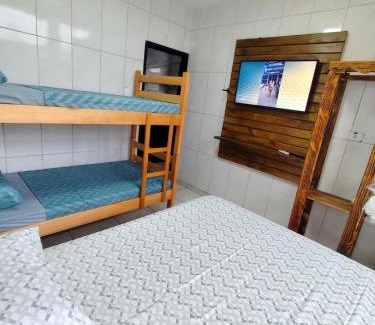 Praia de Leste Apartamento | Studio com ar condicionado a 4 quadras do mar