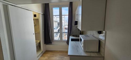 Amerique Apartamento | Studio mezzanine proche Zenith - Paris 19 - 2P