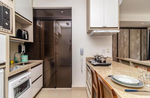 Pompeia Apartamento | Studio moderno em condomínio de luxo pé na areia
