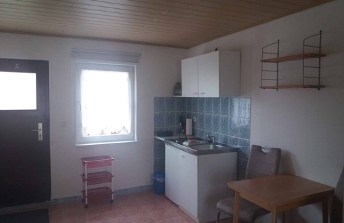 Usedom Apartamento | Apartamento vacacional con barbacoa en el jardín