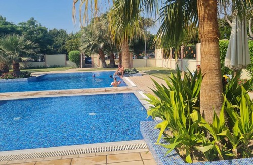 Discovery Gardens Apartamento | Studio with free Tennis court at the yard