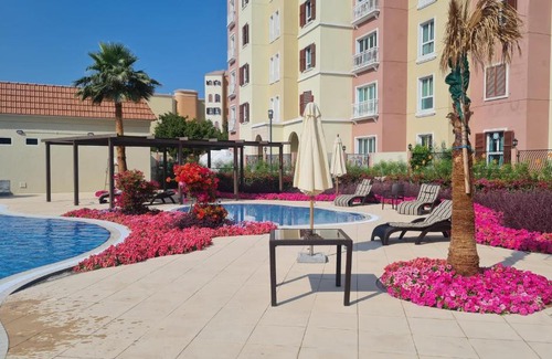 Discovery Gardens Apartamento | Studio with free Tennis court at the yard