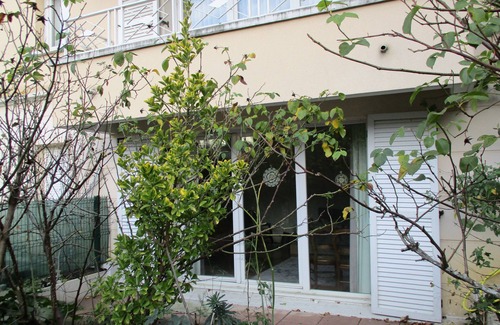 Quartier Centre Ville Apartamento | Estudio con jardin soleado
