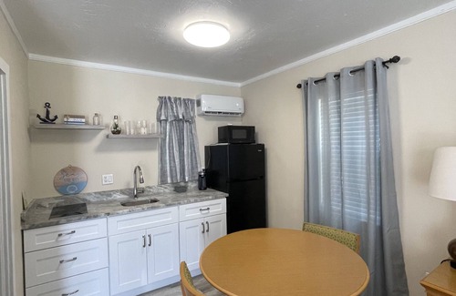 Whitney Beach Hotel | Studios near AMI Beach, Fully Furnished, Kitchenette, Enclosed Lanai”