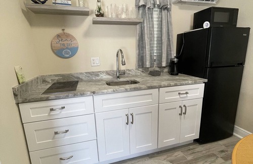 Whitney Beach Hotel | Studios near AMI Beach, Fully Furnished, Kitchenette, Enclosed Lanai”