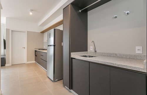 Centro Apartamento | Studios Tower - Building near the postcard with swimming pool in the center of Floripa