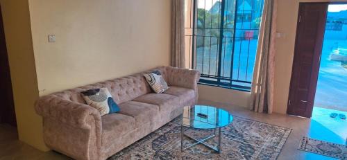 Mlingotini Apartamento | Stunning 2BR in Dar Beach, Dining, Transit Nearby