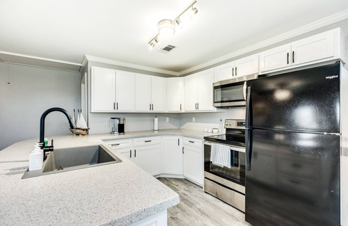 Galveston Casa | Stunning and sunny home with viewing deck, large enclosed yard, & washer/dryer