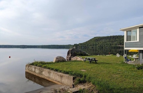 Dedham Cabaña | Stunning lakefront home with 270° water views and private beach near Acadia