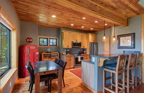Coeur d'Alene Casa | Stunning mountain escape with lake views, expansive furnished deck & firepit - dog-friendly
