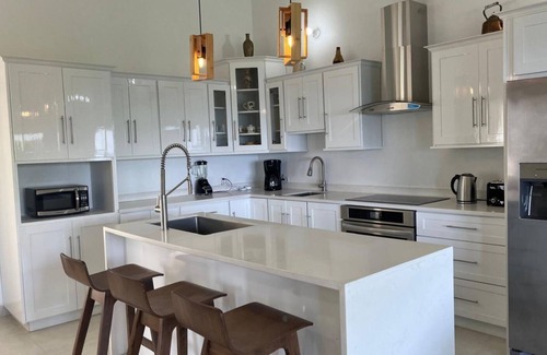 Concordia Casa | Stunning ocean views, spacious, open-concept, modern luxury & tropical charm.