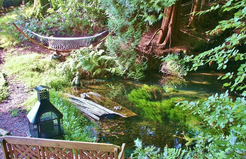 Llanidloes Casa | Stunning panoramic views & 2 acre woodland with 5 pools, waterfalls & 17 benches