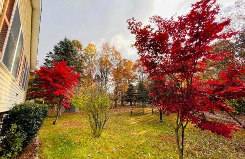 East Stroudsburg Villa | Stunning Poconos Villa- Hot Tub, Pool, Game Room, BBQ & more
