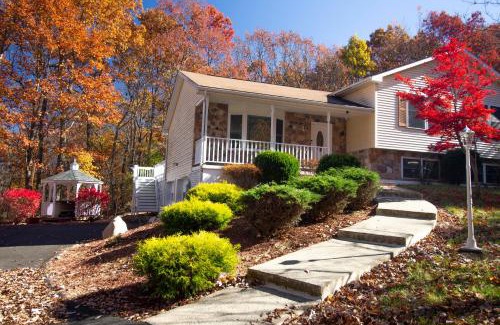 East Stroudsburg Villa | Stunning Poconos Villa- Hot Tub, Pool, Game Room, BBQ & more