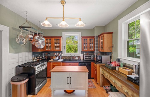 Weaverville Casa | Stunning Restored Victorian on a Picturesque Lot with Flower Garden & Fountain