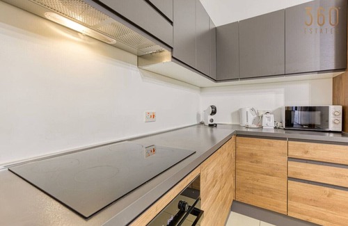 St. Andrew's Apartamento | Stylish 1BR home with full amenities in Swieqi!