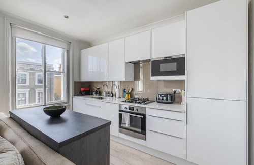 Redcliffe Apartamento | Stylish 2BR Chelsea Penthouse w/ Private Rooftop