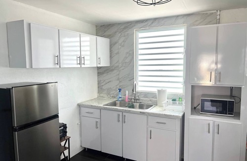 Sabana Abajo Apartamento | Elegante apartamento de 2 habitaciones con balcón privado