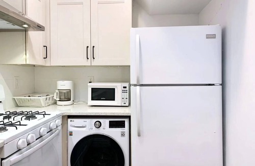 East Flushing Casa | Stylish 3-bedroom House with Skylight and Access to Rooftop Deck and Patio