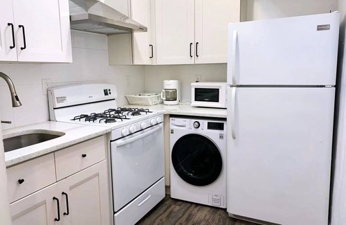East Flushing Casa | Stylish 3-bedroom House with Skylight and Access to Rooftop Deck and Patio