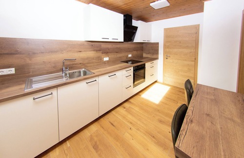 Valle San Silvestro Apartamento | Stylish alpine apartment with tiled stove, sauna & panoramic view