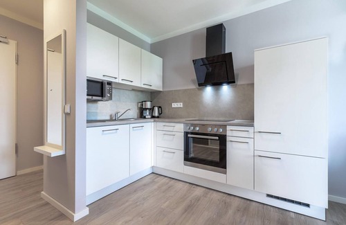 Alt-Travemunde/Ronnau Apartamento | Stylish apartment with loggia, right next to the park and only 300 meters to the Baltic Sea -