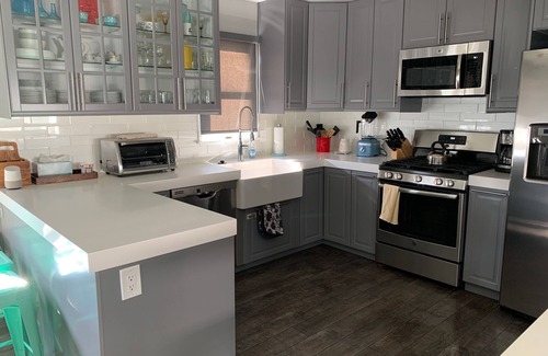 North Beach Haven Casa | Elegante Brant Beach Oceanside House. Remodelación 2018, 3 casas a Ocean & por BBYC