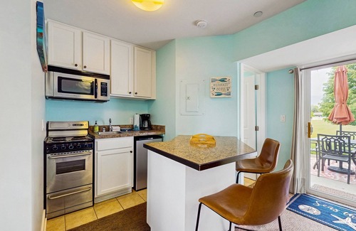 Douglas Condominio | Stylish condo with well-equipped kitchen, pool, firepits, grill, & gas fireplace