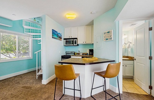 Douglas Condominio | Stylish condo with well-equipped kitchen, pool, firepits, grill, & gas fireplace