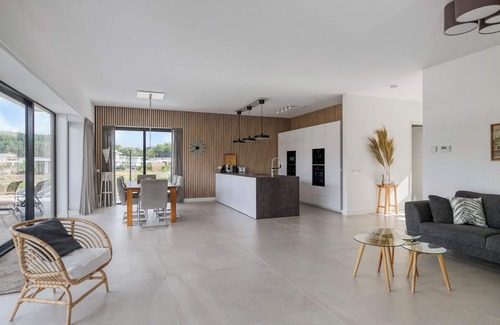 Zeewolde Casa | Stylish detached 6-person villa with private sauna, three en-suite bathrooms and private dock on the water