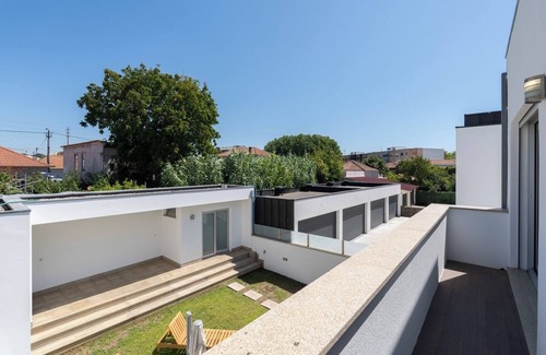 Senhora da Hora Casa | Stylish Home w/ Garage and Terrace by HostWise