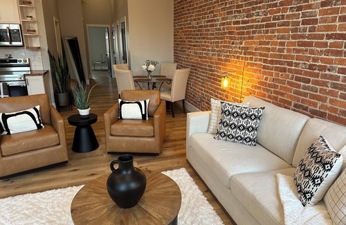 Warsaw Apartamento | Stylish & Modern 2-Bdrm Apt in Downtown Warsaw featuring an urban rooftop deck.
