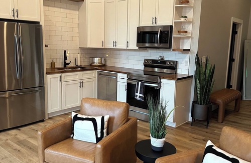 Warsaw Apartamento | Stylish & Modern 2-Bdrm Apt in Downtown Warsaw featuring an urban rooftop deck.