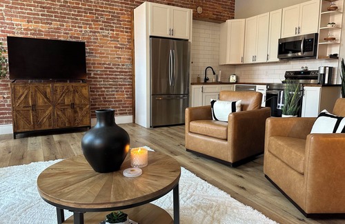 Warsaw Apartamento | Stylish & Modern 2-Bdrm Apt in Downtown Warsaw featuring an urban rooftop deck.