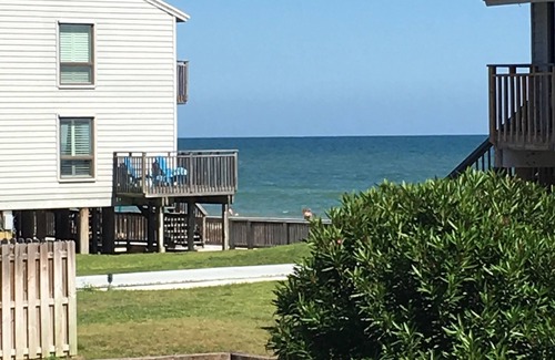 East End Casa | ¡Cerca de la playa! Agradable y acogedor, Se admiten mascotas Ocean Mile Condo # L-11!