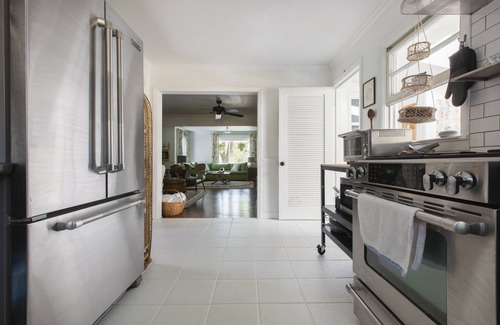 Brevard Cabaña | Stylish mountain cottage walkable to downtown with private backyard.