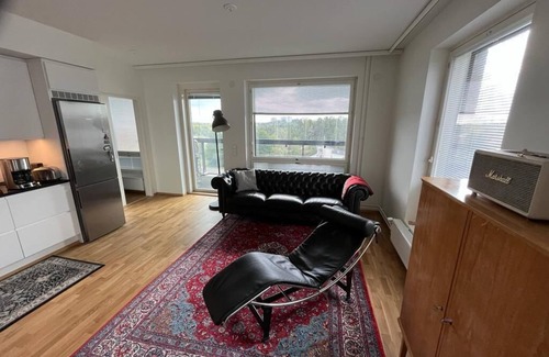 Espoo Apartamento | Stylish new apartment with indoor access to metro and shopping center.