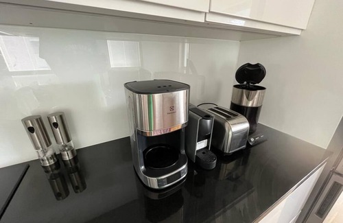 Espoo Apartamento | Stylish new apartment with indoor access to metro and shopping center.