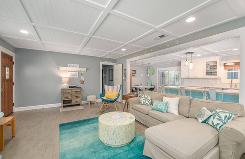 Tybee Island Cabaña | Stylish Ranch w/ Screened-In Porch 5 Minute Walk to Beach by Tybee Cottages