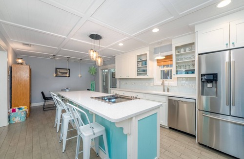 Tybee Island Cabaña | Stylish Ranch w/ Screened-In Porch 5 Minute Walk to Beach by Tybee Cottages