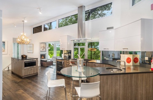 Saugatuck Casa | Stylish riverfront retreat w/ hot tub, screened boathouse, fishing dock & kayaks