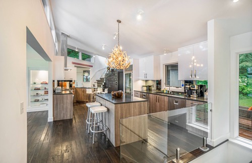 Saugatuck Casa | Stylish riverfront retreat w/ hot tub, screened boathouse, fishing dock & kayaks